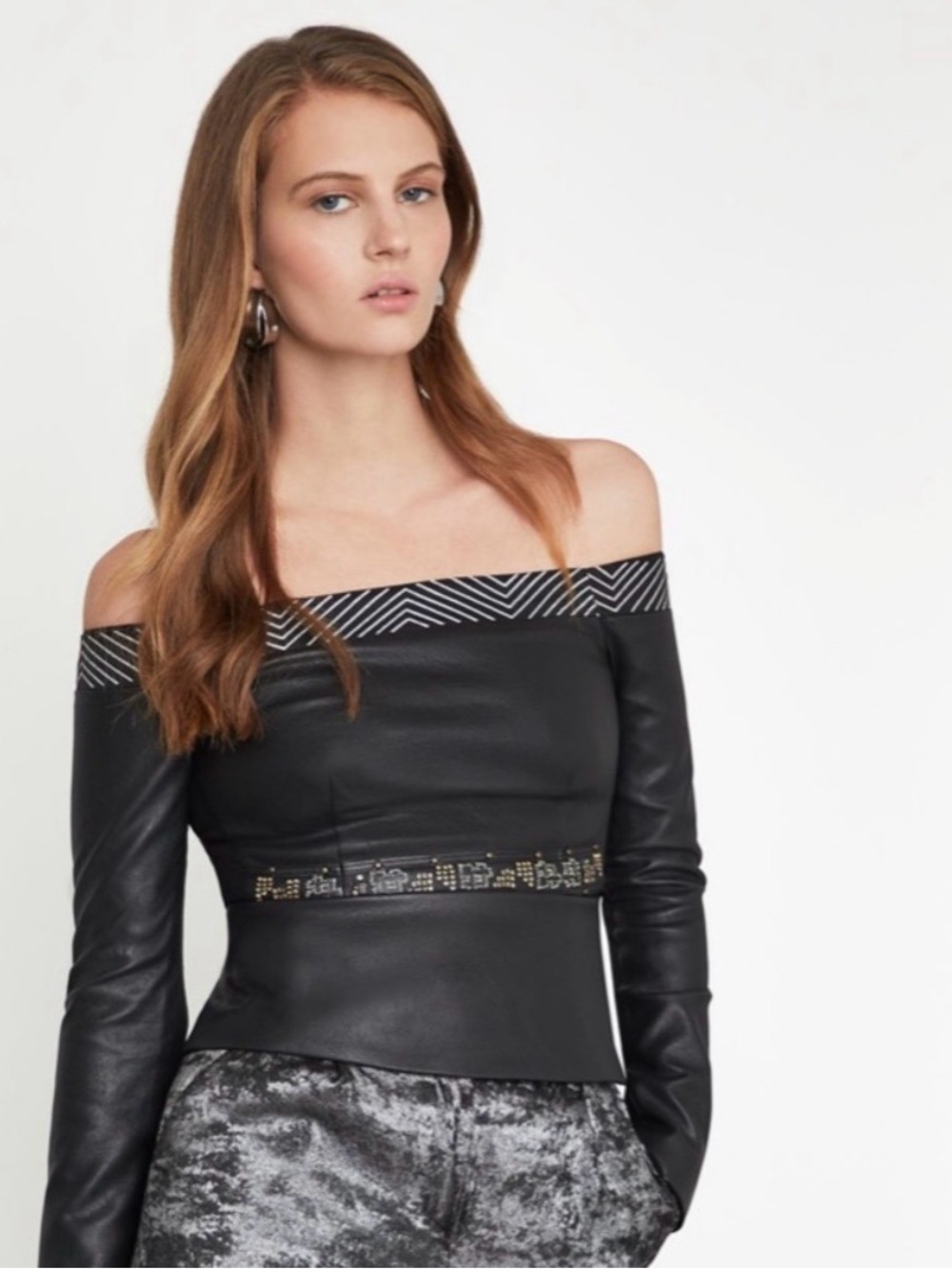 BCBGMaxAzria Off-Shoulder Black Faux Leather Top with Geometric Trim